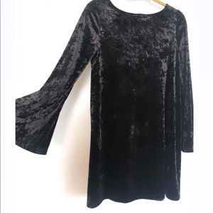 Black velvet bell sleeve dress